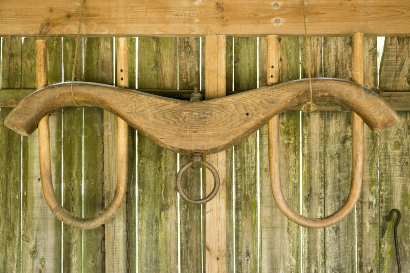 Yoke hanging on wooden barn
