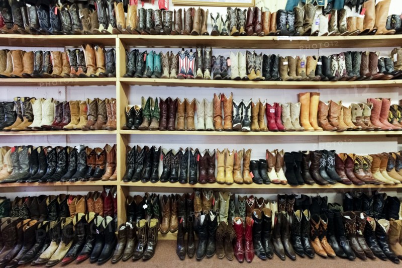 Vintage cowboy boots on shelves