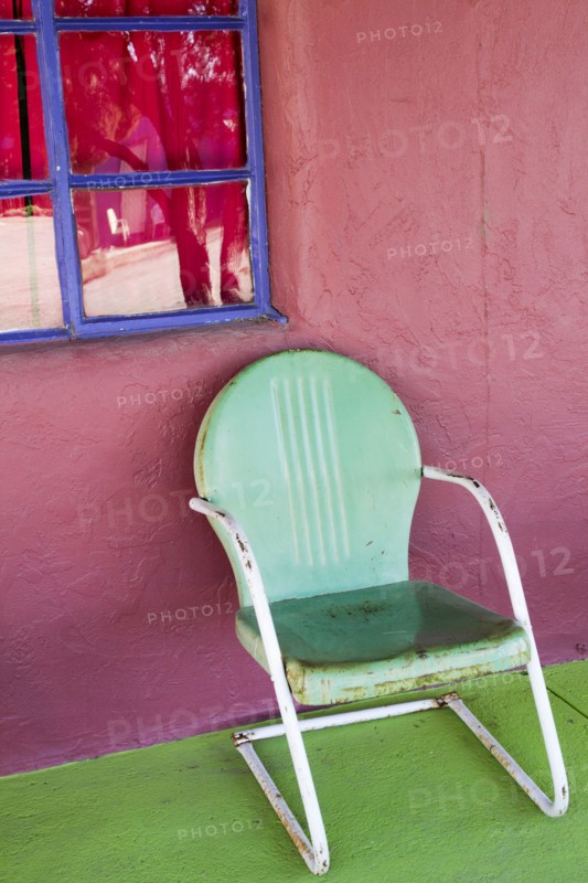 Retro metal chair on porch