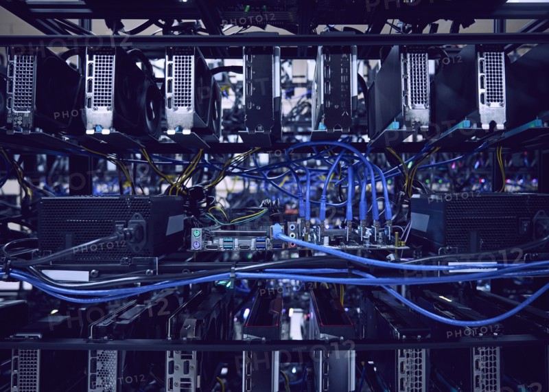 Close-up of computer cables and hard drives in server room