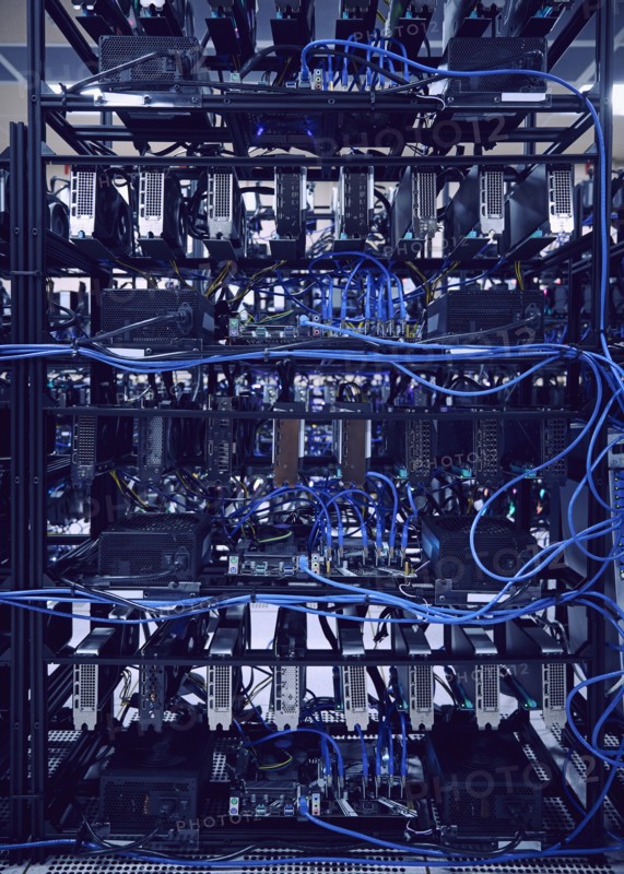 Close-up of computer cables and hard drives in server room