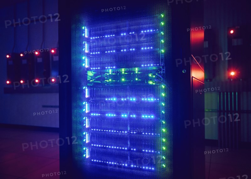 Glowing hard drives in dark server room