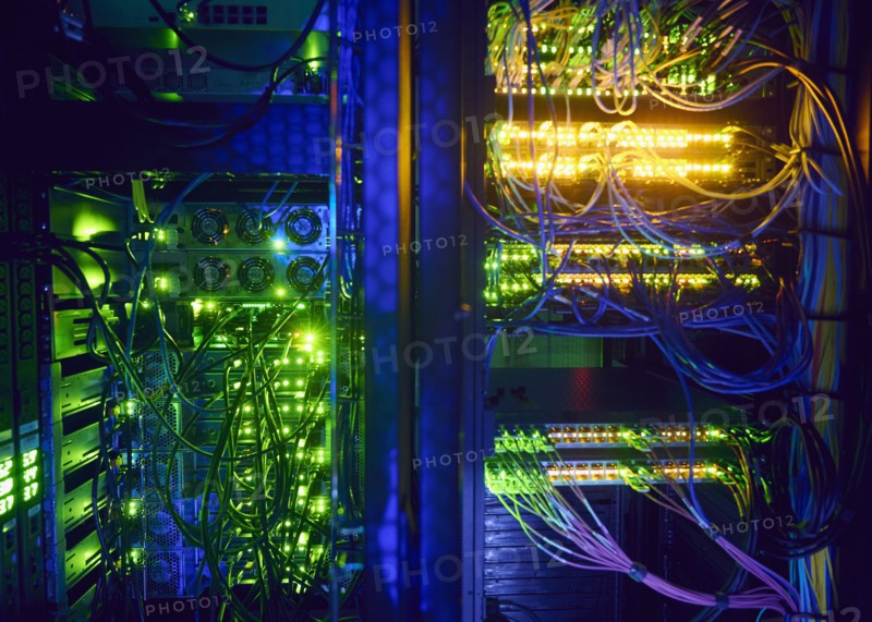 Illuminated network cables in server room