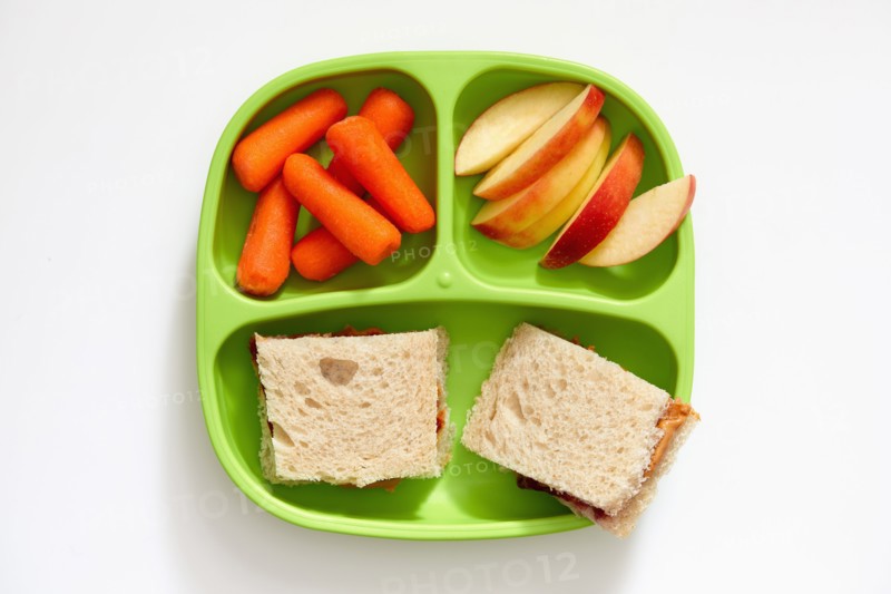 Healthy packed lunch on tray for child