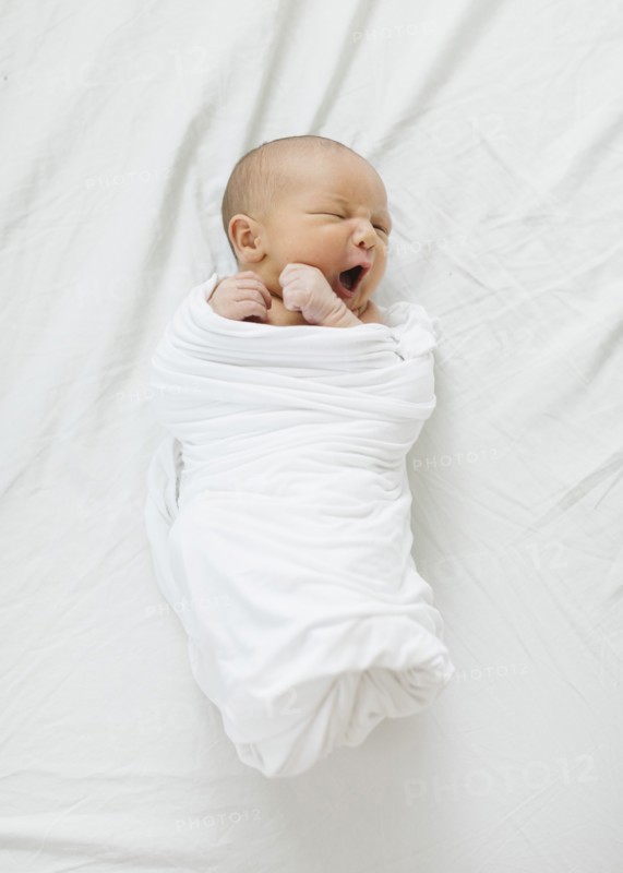 Overhead view of newborn baby boy