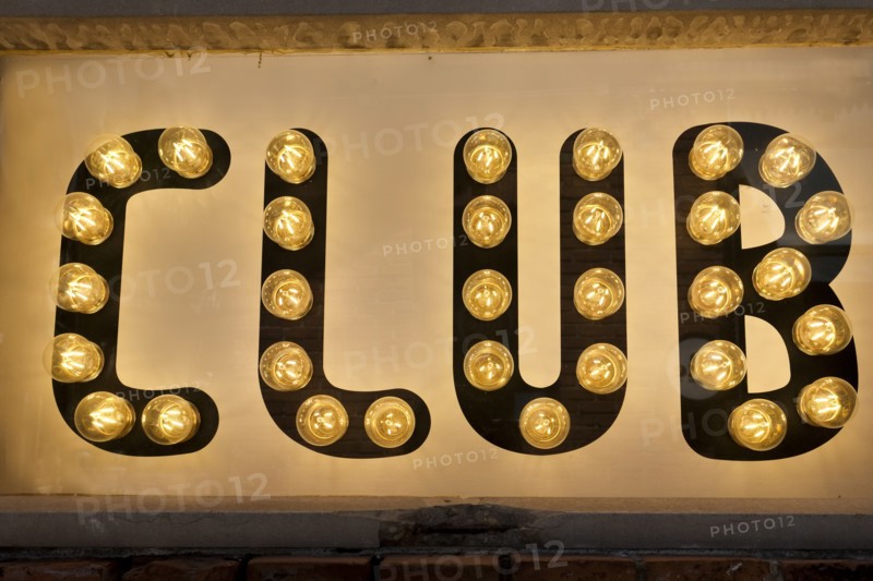 Close-up of illuminated club sign
