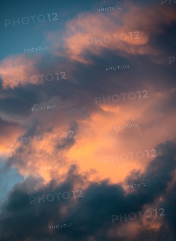 Dramatic storm clouds at sunset