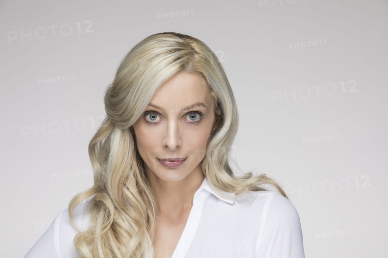 Studio portrait of beautiful blond woman