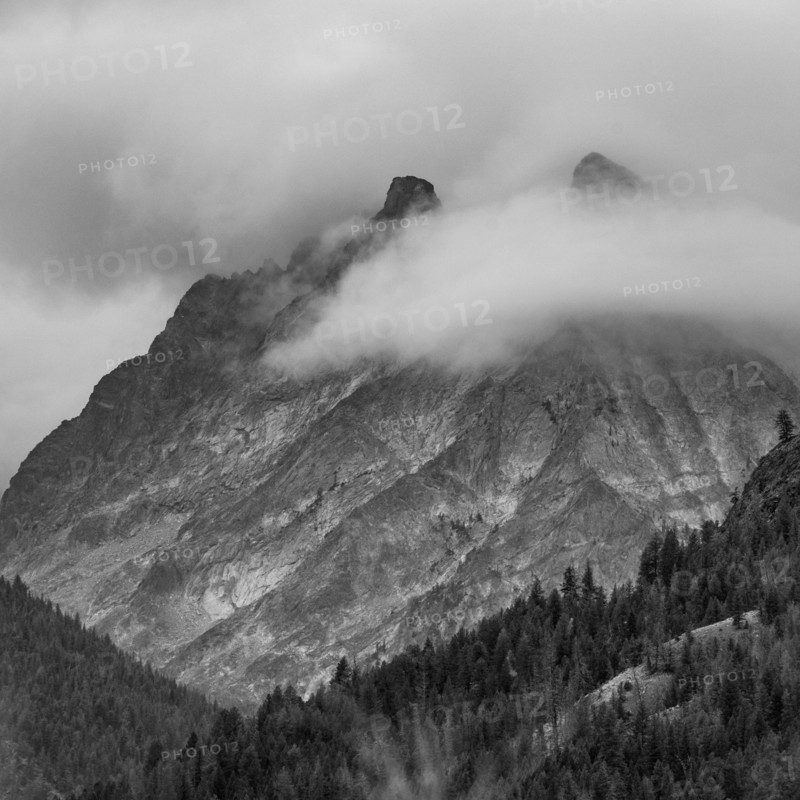 Clouds covering mountain peaks