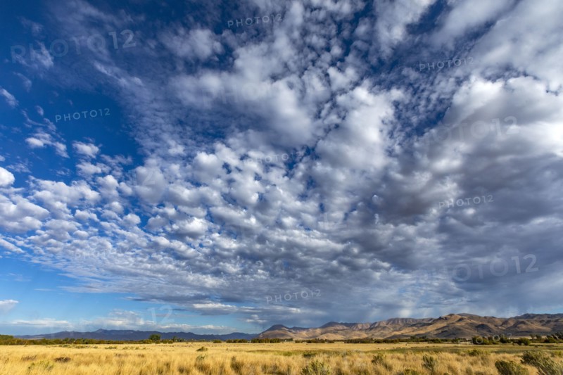 Clouds over foothills