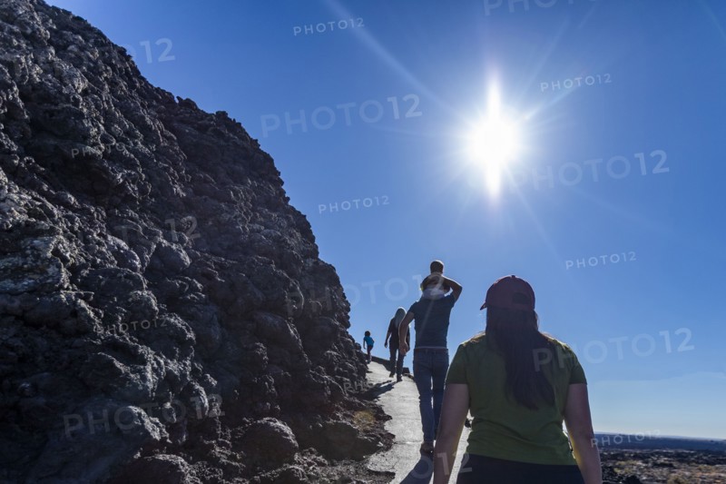 Family visits Craters of Moon National Monument