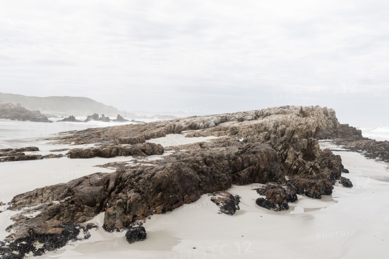 Rock formations on Voelklip Beach