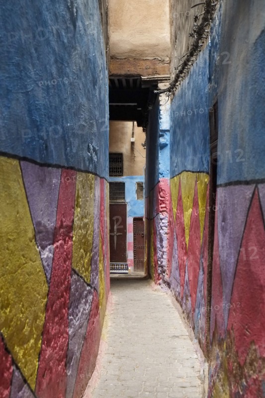 Colorful walls in alleyway in medina