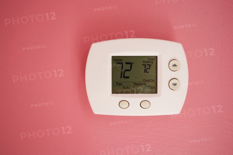 Wall thermostat at 72 degrees Fahrenheit