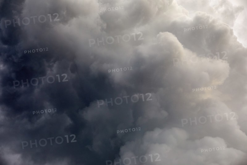 Dramatic gray storm clouds on sky