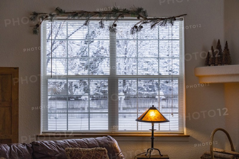 View from living room to snowy outdoors
