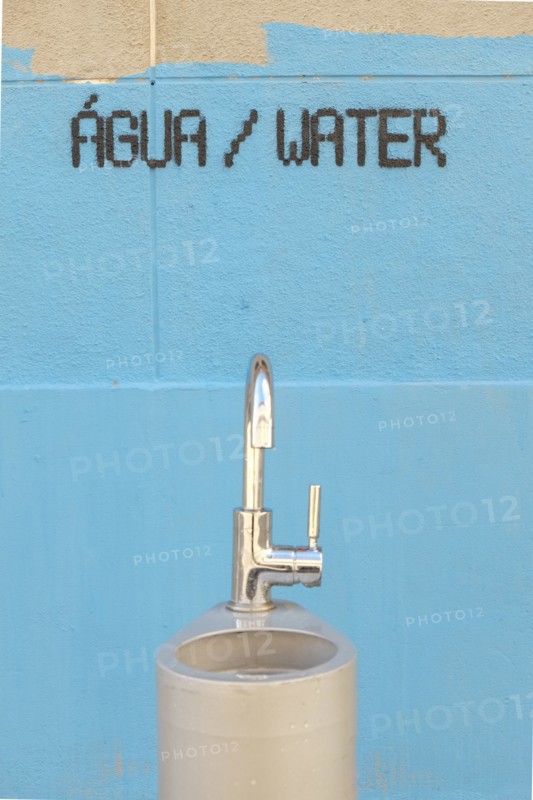 Water fountain and painting on wall