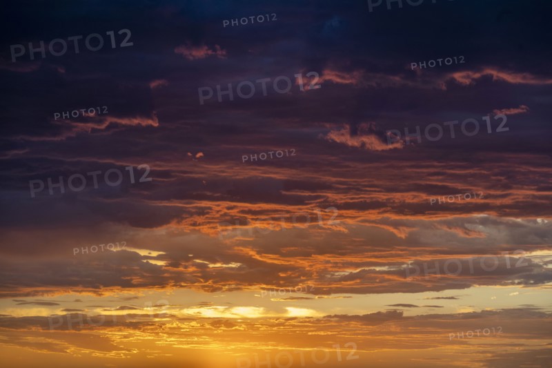 Dramatic storm clouds at sunset