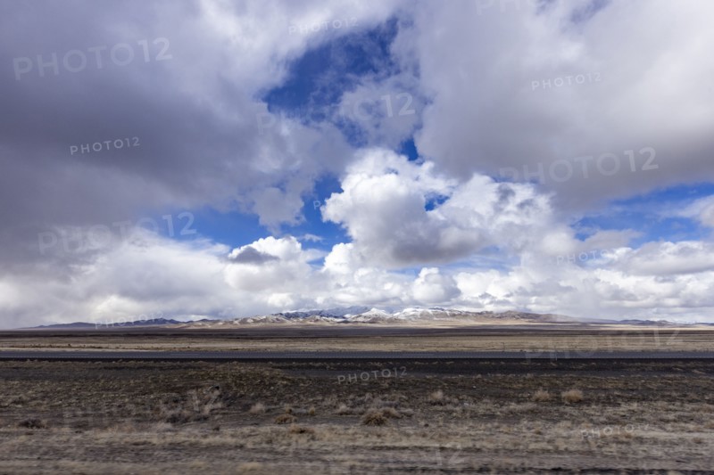 McDermitt, White clouds above desert and mountains in background