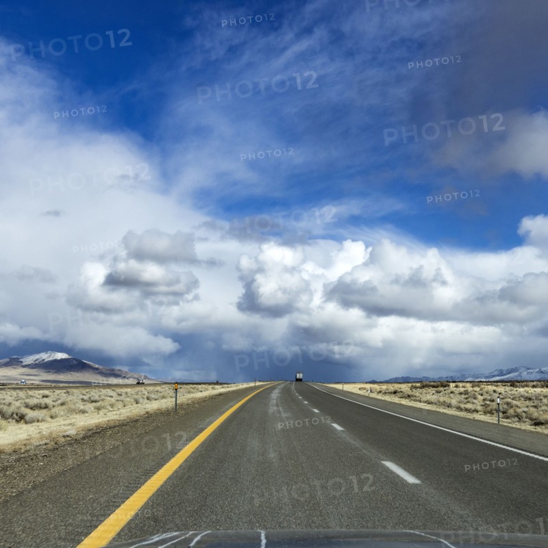 Winnemucca, Highway leading towards white clouds on horizon
