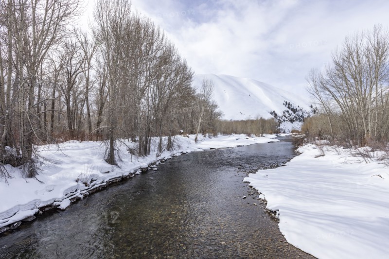 River flowing in mountains in winter