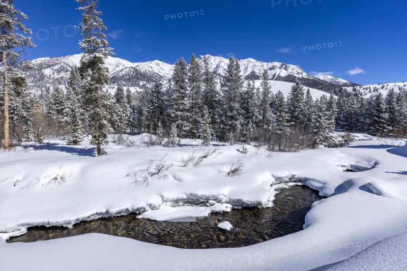River flowing in mountains in winter