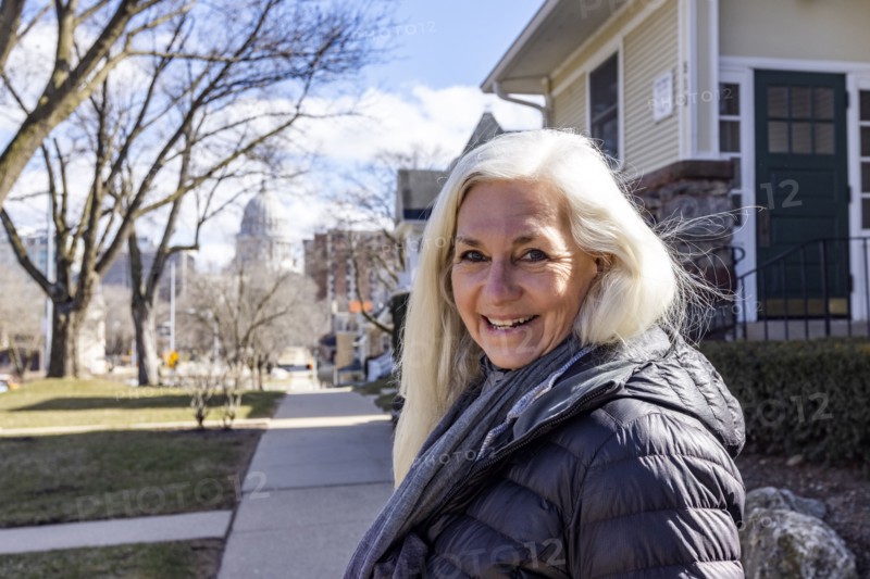 Portrait of senior woman on sidewalk