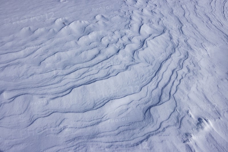 Abstract patterns on snow, full frame