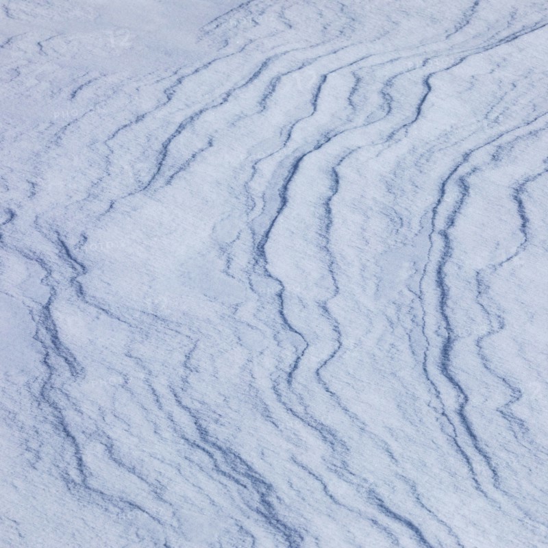 Abstract patterns on snow, full frame