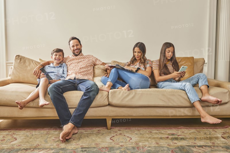 Smiling family with two children