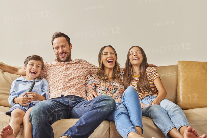 Smiling family with two children