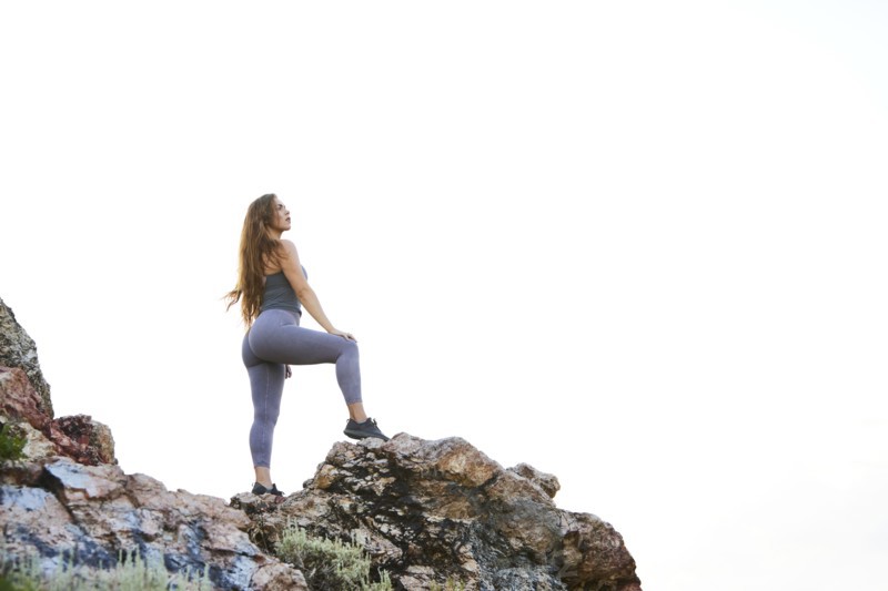 Mid adult woman hiking in mountains