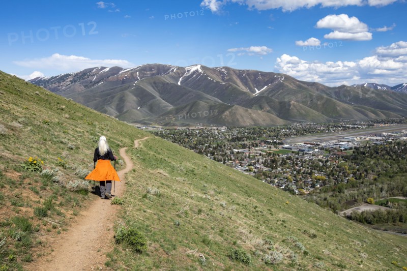 Senior blonde woman hiking on Carbonate Mountain trail