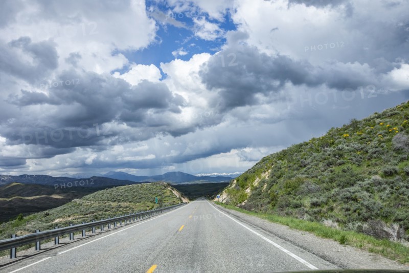 Storm clouds gathering above highway