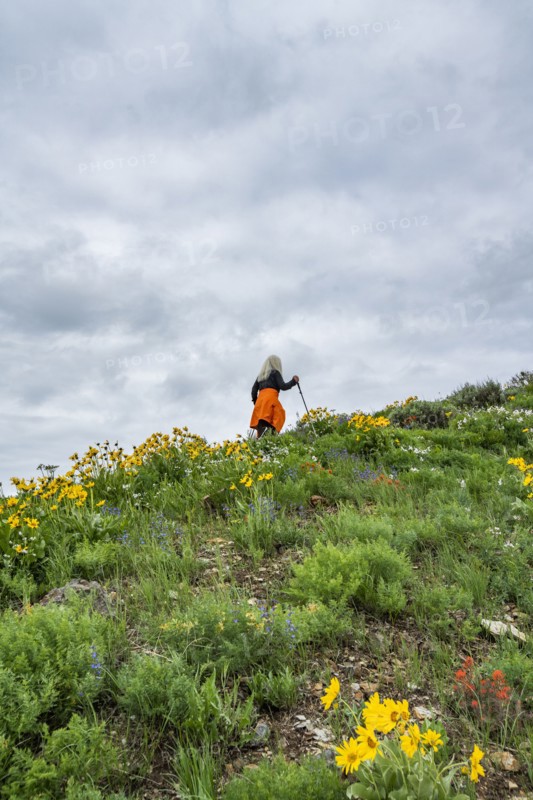 Senior blonde woman hiking on Carbonate Mountain trail