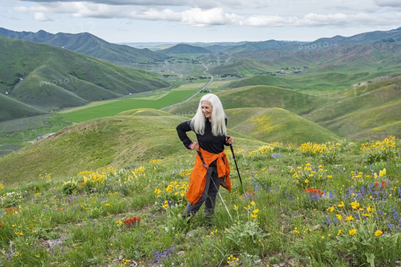 Senior blonde woman hiking on Carbonate Mountain trail