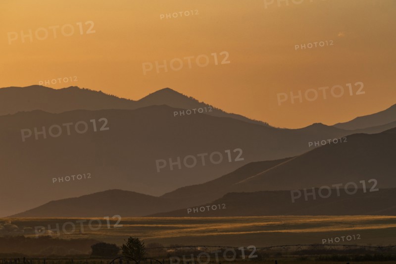 Scenic view of mountain landscape at sunset