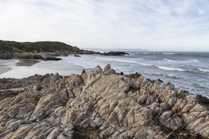 Rocky coastline of Atlantic Ocean in Voelklip Beach