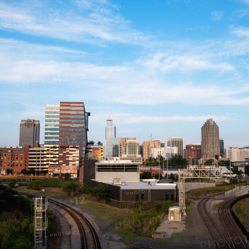 City skyline against blue sky