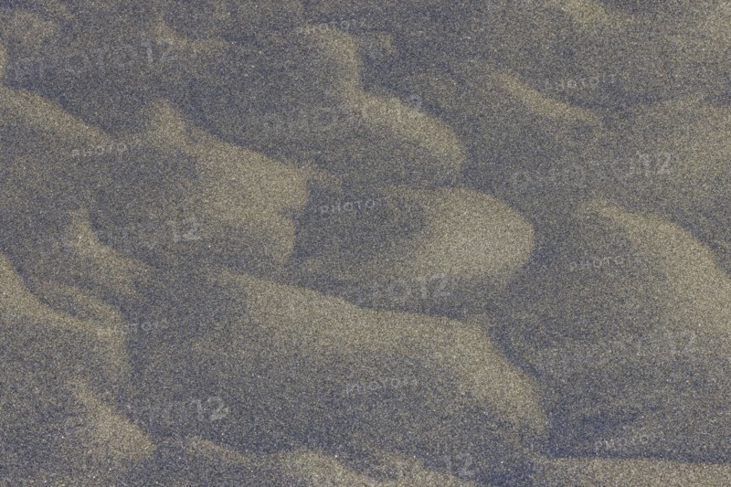 Wind sculpted patterns in beach sand