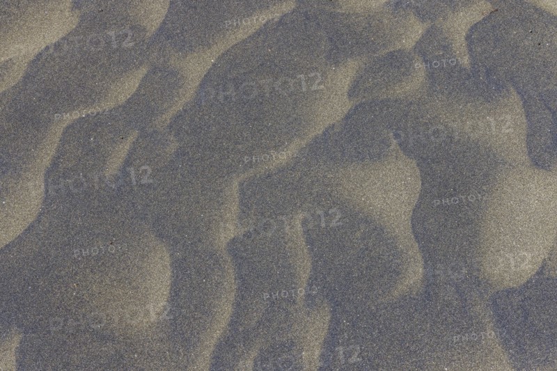 Wind sculpted patterns in beach sand