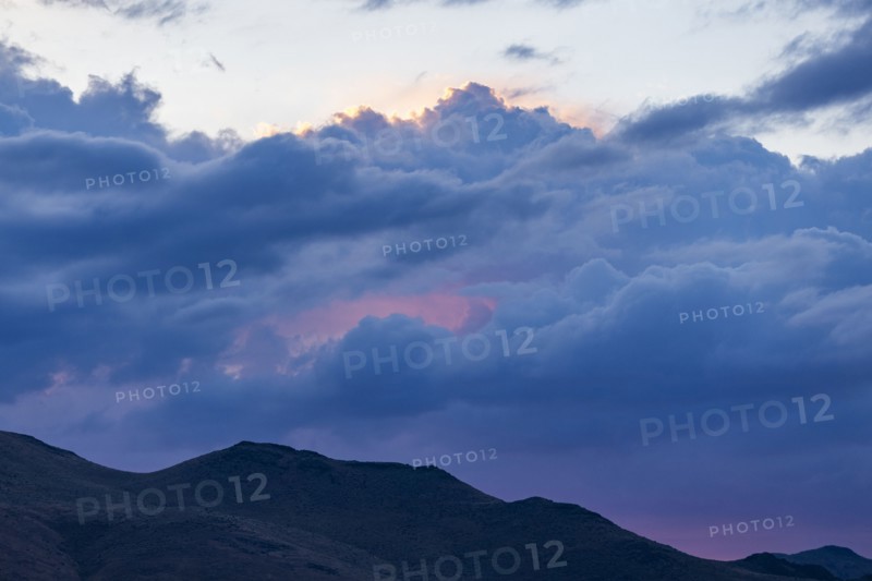 Beautiful dawn over silhouettes of mountains