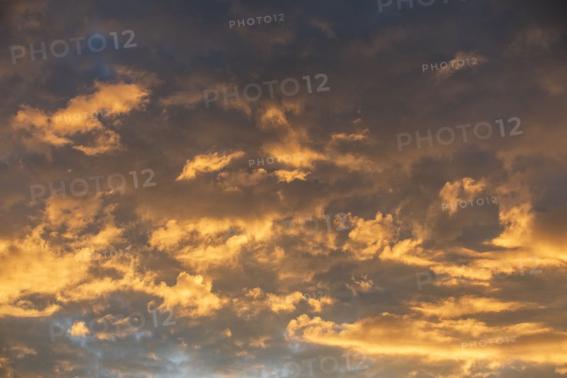 Clouds illuminated by setting sun