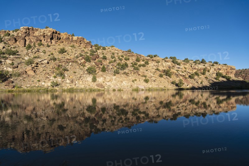 Usa, New Mexico, Abiquiu, Rio Chama, Hills reflected in Chama River, Abiquiu, New Mexico, USA