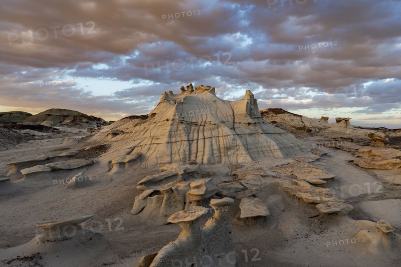 Usa, New Mexico, Bisti Wilderness, Clouds over badlands rock formations in Bisti/De-Na-Zin Wilderness, , New Mexico, USA