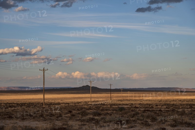 Usa, New Mexico, Shiprock, Electricity poles in High Desert, Shiprock, New Mexico, USA