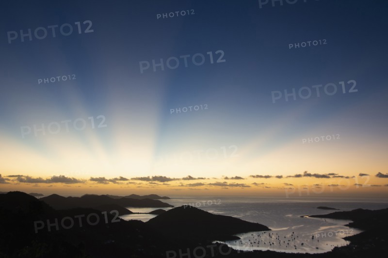 USA, United States Virgin Islands, St. John, Sunbeams over Caribbean Sea at sunset, St. John, United States Virgin Islands, USA