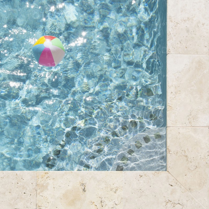 Beach ball floating in swimming pool, St. John, United States Virgin Islands, USA
