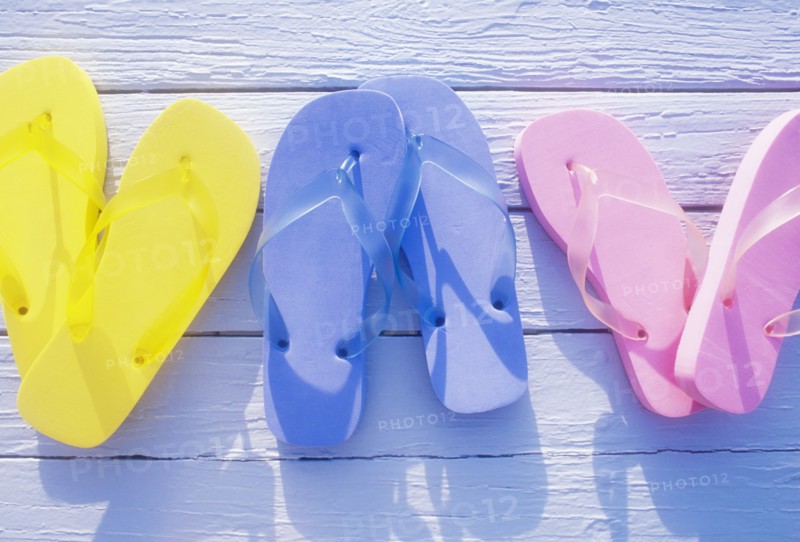 USA, Virgin Islands, St. John, Overhead view of colorful flip flops on deck, St. John, United States Virgin Islands, USA