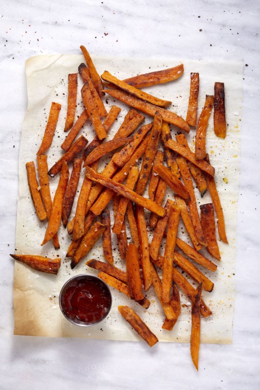 Overhead view of sweet potato fries and small bowl of ketchup, New York, New York, USA